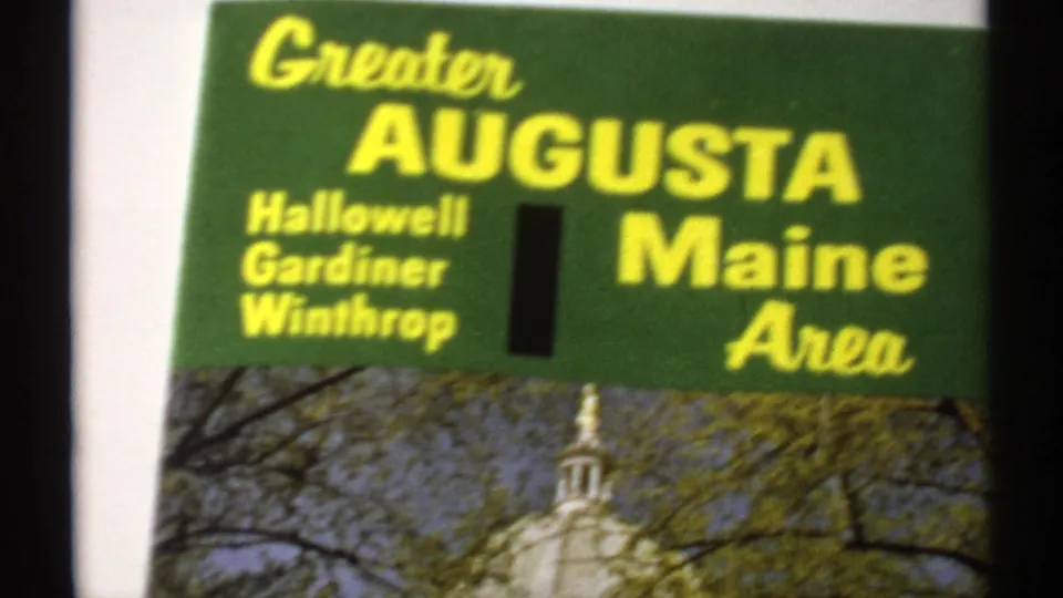Final close frame on the Greater Augusta Maine Area brochure, showing town names and the upper portion of the State Capitol photograph.