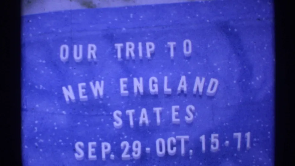 Blue 1971 home-movie title card with white lettering for a New England states vacation and dated line near the bottom.