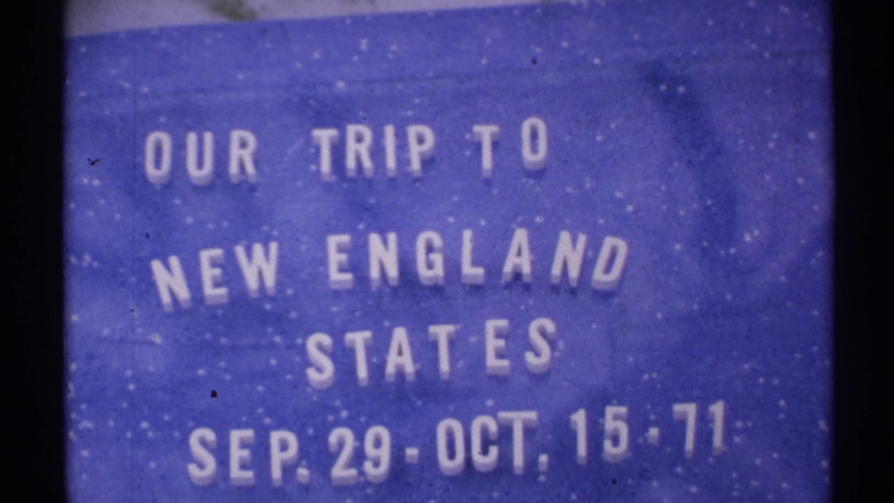 1971 8mm home-movie title card on a blue background announcing a trip to the New England states.