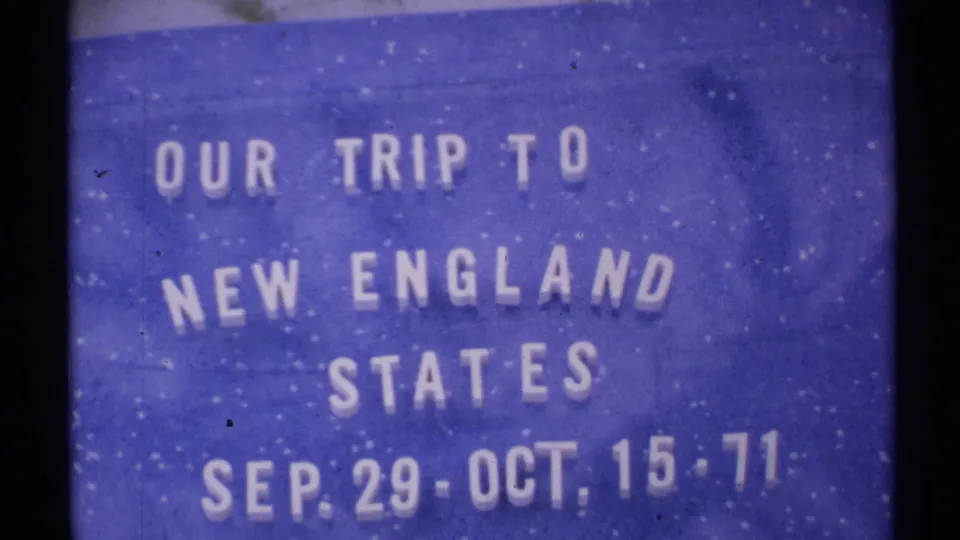 1971 8mm home-movie title card on a blue background announcing a trip to the New England states.