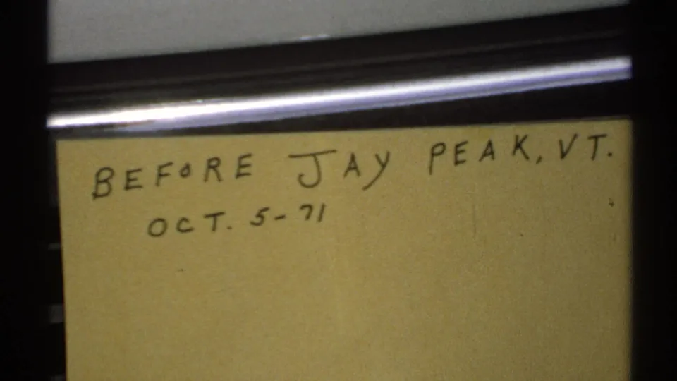 Second close-up of the yellow travel note card, with Jay Peak, Vermont and Oct. 5-71 written across the top.