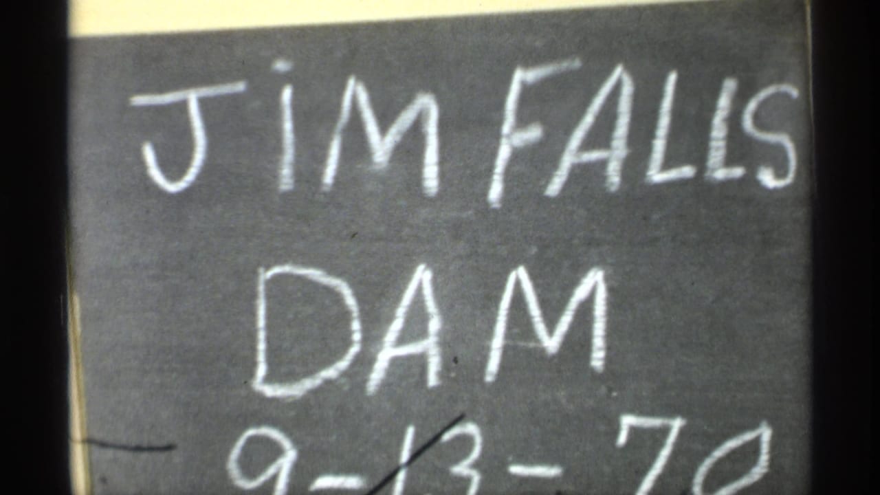 Chalkboard title card reading Jim Falls Dam with date partly visible.