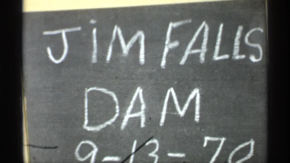 1971 home-movie title card reading Jim Falls Dam, with the handwritten date partly visible at the bottom.