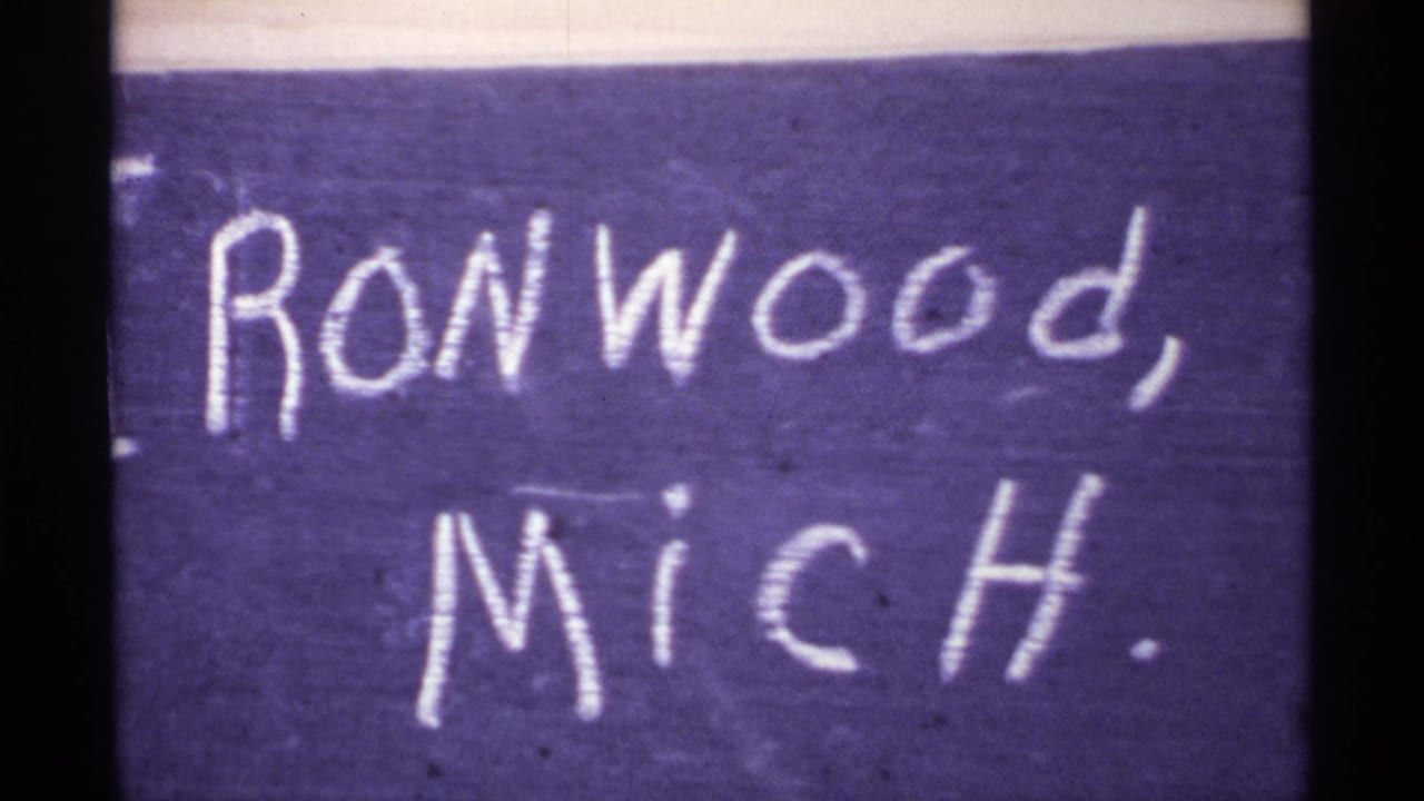 Hand-written title card reading Ironwood, Mich. on dark paper.