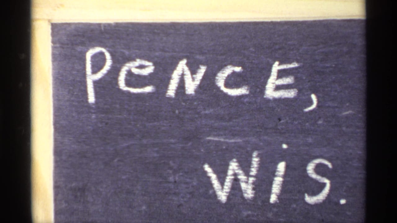 Chalkboard close-up with white chalk text reading Pence, Wis.