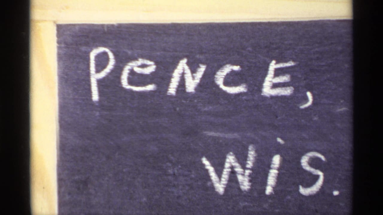 Chalkboard close-up with the words Pence, Wis. written in chalk.