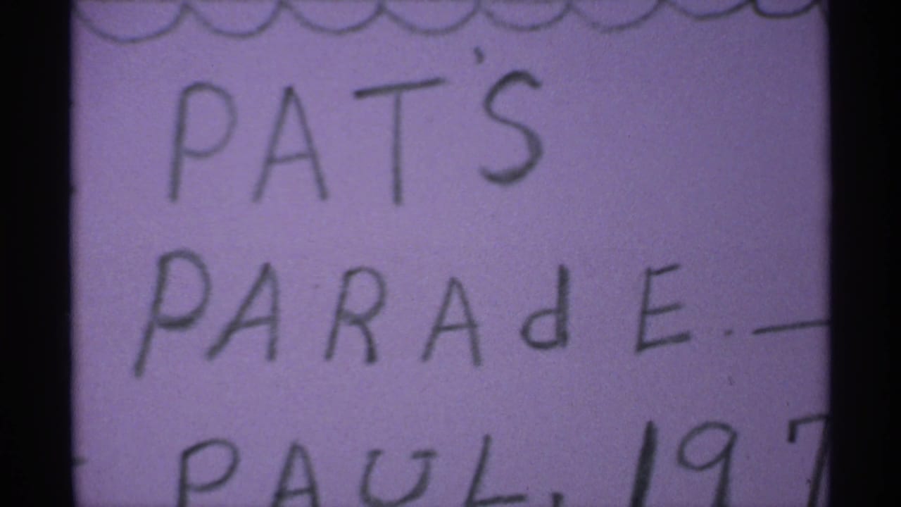 Purple-tinted handwritten title card for Pat's Parade, with partial Paul and 1971 text visible.