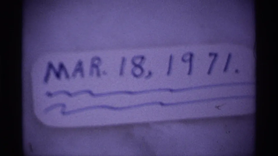 Second close-up of the handwritten March 18, 1971 label, reinforcing the footage date with home-movie film softness.
