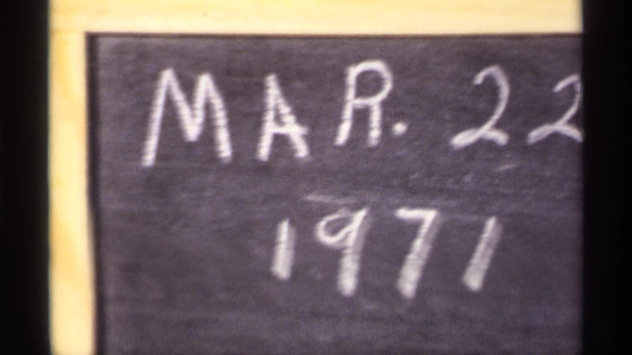 Handwritten March 22, 1971 date on a dark film leader card.