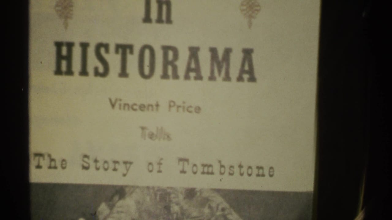 1972 Arizona 8mm frame showing a HISTORAMA title card with Vincent Price credited as narrator for The Story of Tombstone.