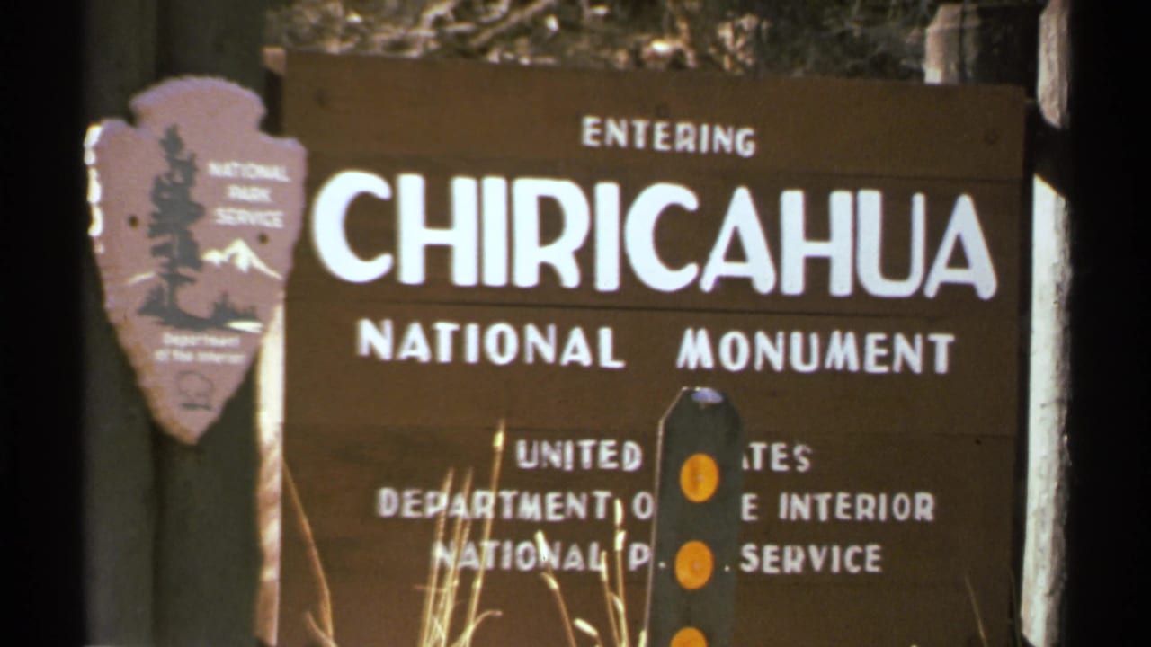1972 Arizona 8mm frame showing the Chiricahua National Monument entrance sign with National Park Service marking.