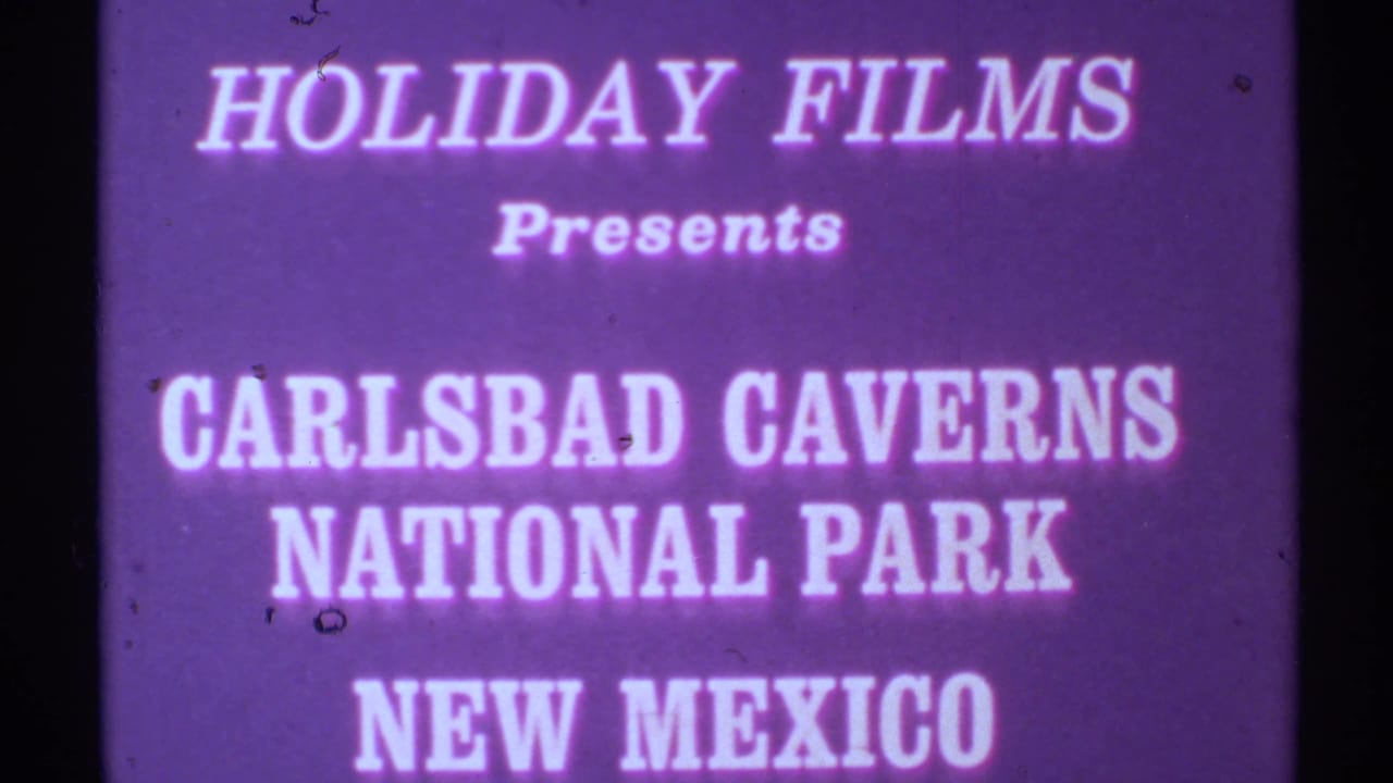 Purple title card reading Holiday Films presents Carlsbad Caverns National Park New Mexico.