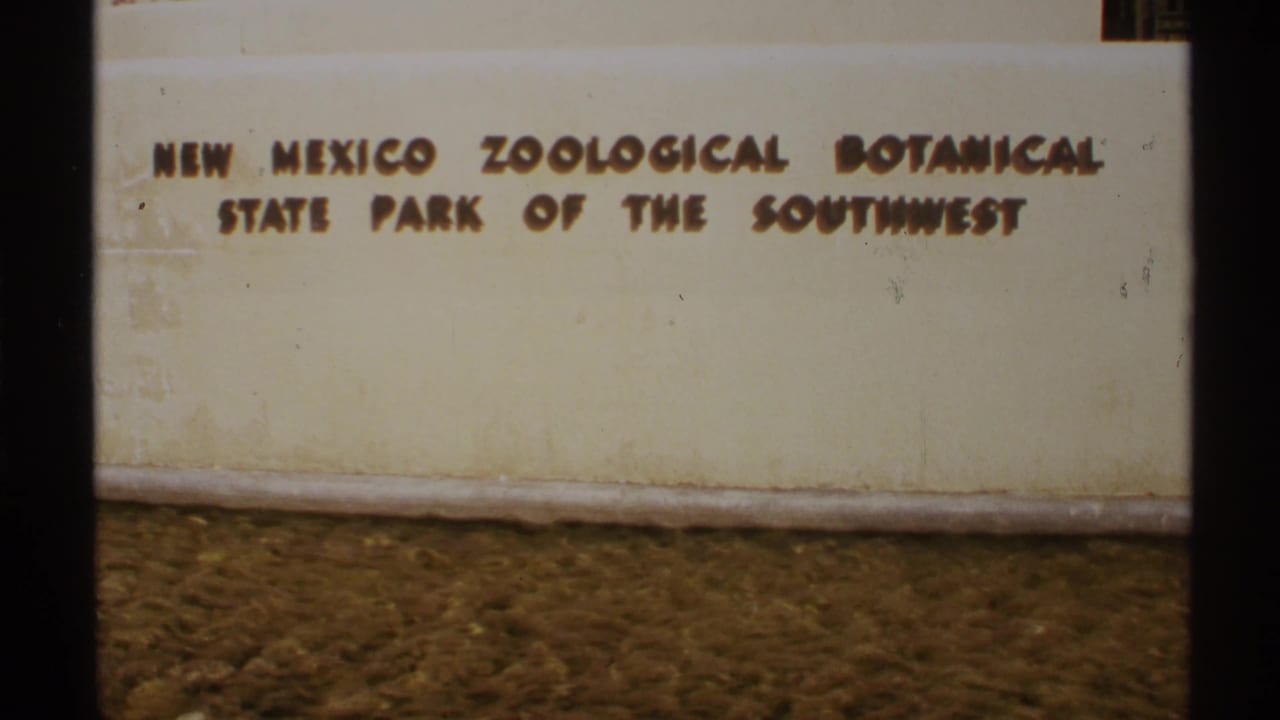 Cream wall with raised lettering for the New Mexico Zoological Botanical State Park of the Southwest.