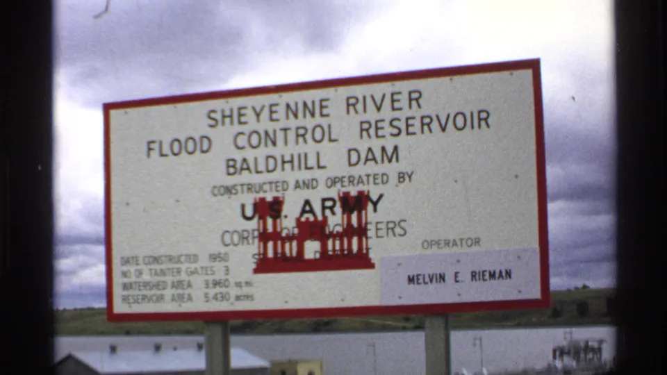 North Dakota 1972 frame centered on the Baldhill Dam and Sheyenne River Flood Control Reservoir sign.