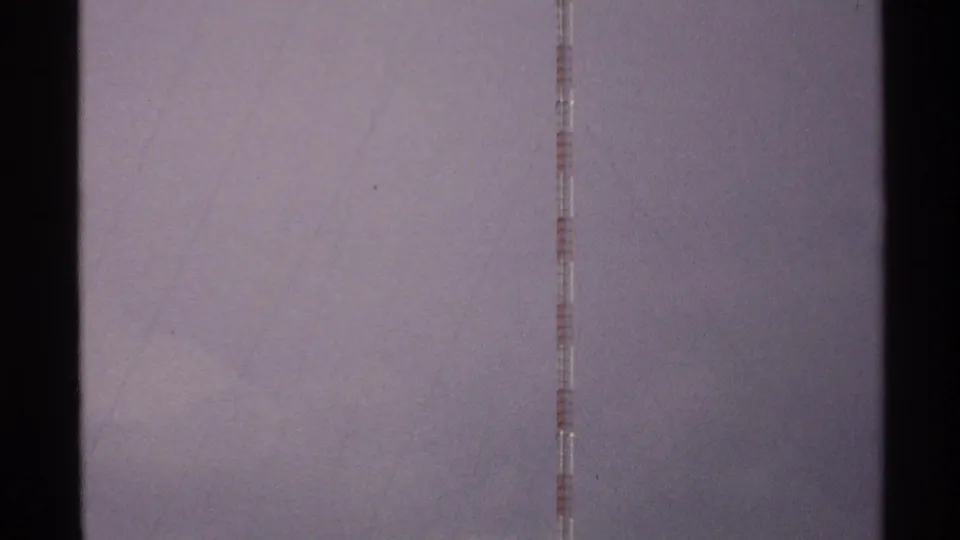 Final 1972 North Dakota 8mm frame with the antenna line near the right side and muted sky tones.
