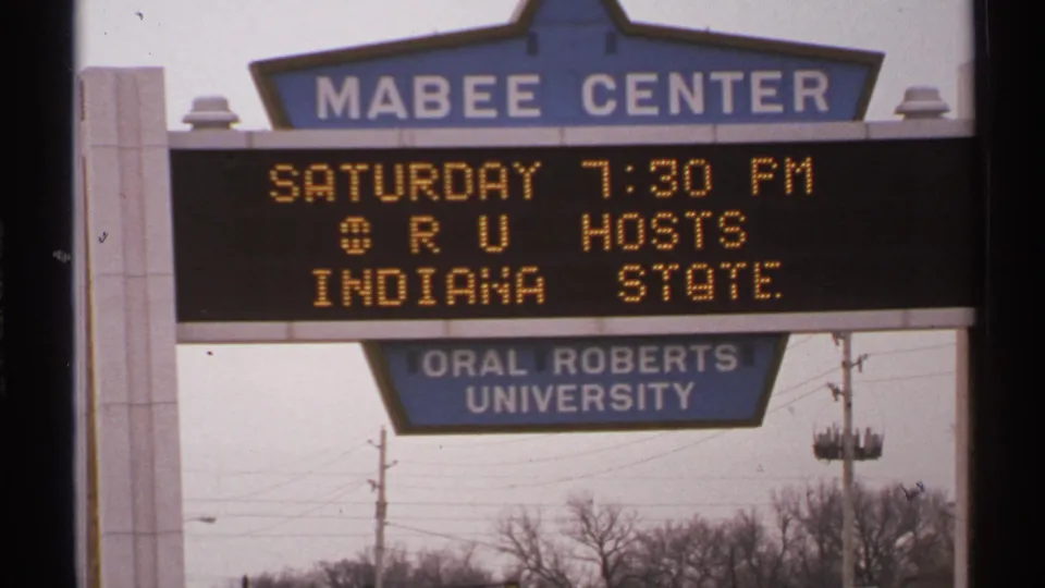 1972 Tulsa 8mm frame holding on the Mabee Center marquee for ORU hosting Indiana State.