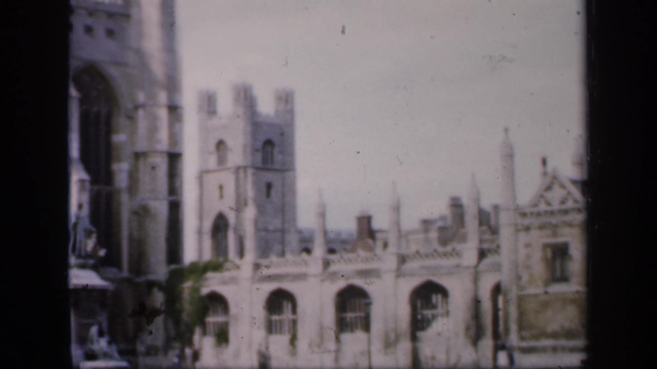 Soft 8mm view of Gothic cathedral buildings with arched windows and towers.
