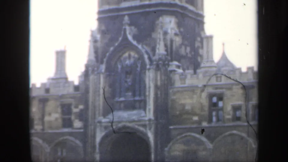 Soft 8mm view of the cathedral tower and upper Gothic stonework in England, dated 1949 by clip metadata.