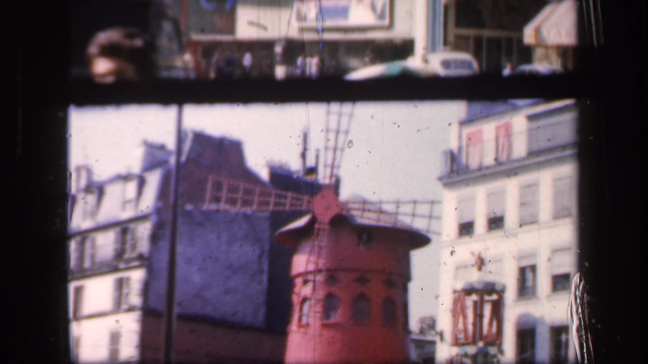 Moulin Rouge windmill repeated in a softer framed view.