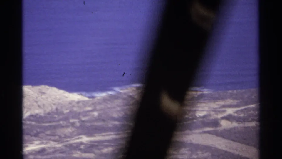 1974 Cabo San Lucas beach and ocean view with dark foreground obstruction crossing the 8mm frame.