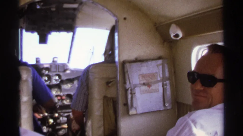 The final frame shows the passenger partly cropped at right, with the small aircraft cockpit and cabin details still visible.