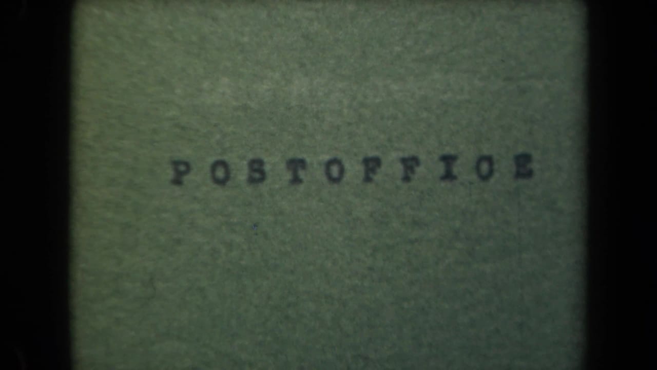 Green textured field with POSTOFFICE typed across the upper portion.
