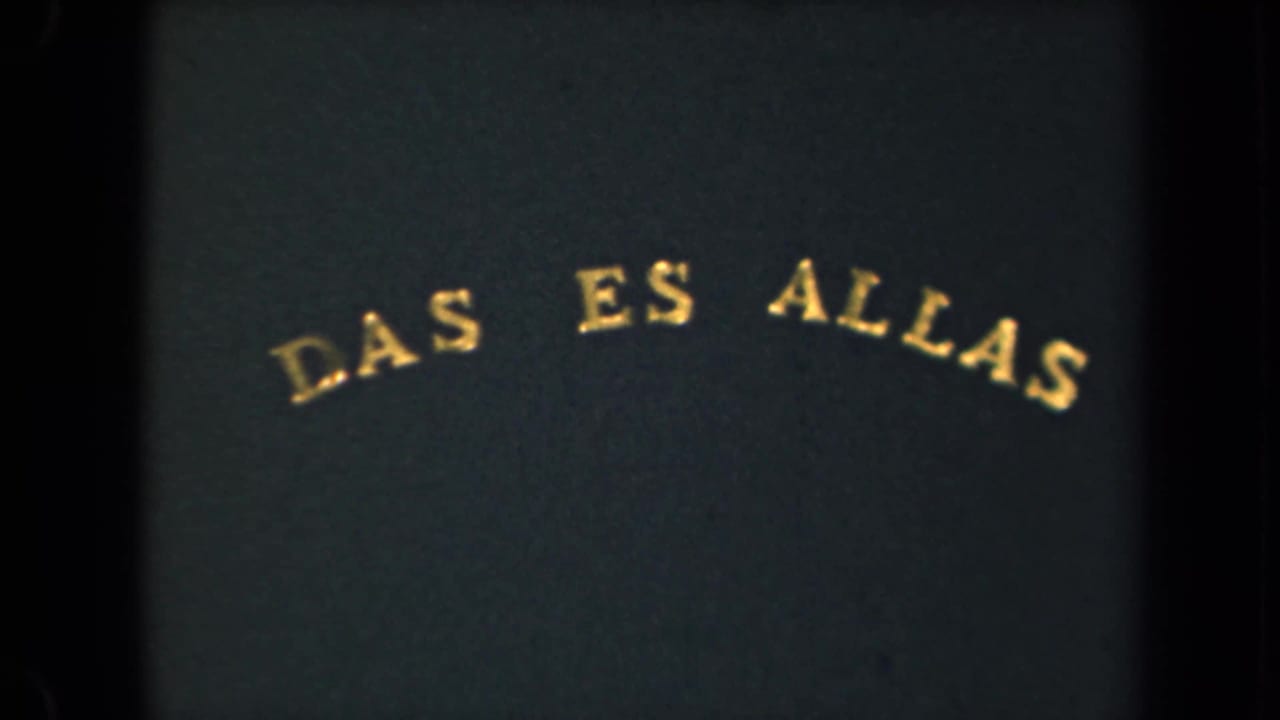 Gold "DAS ES ALLAS" lettering near the top of a dark green-blue card.