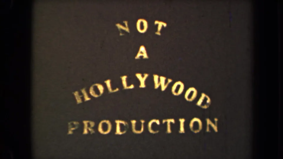 1946 8mm frame from New York with a humorous end card reading “NOT A HOLLYWOOD PRODUCTION.”