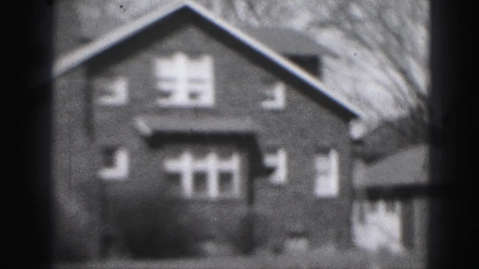 1946 Harrisburg 8mm frame showing a softly focused two-story house with a triangular gable and front windows.