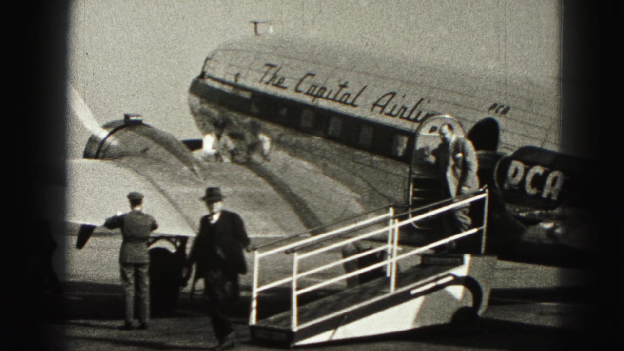 Passengers descend a stairway from a marked Capital Airlines aircraft.