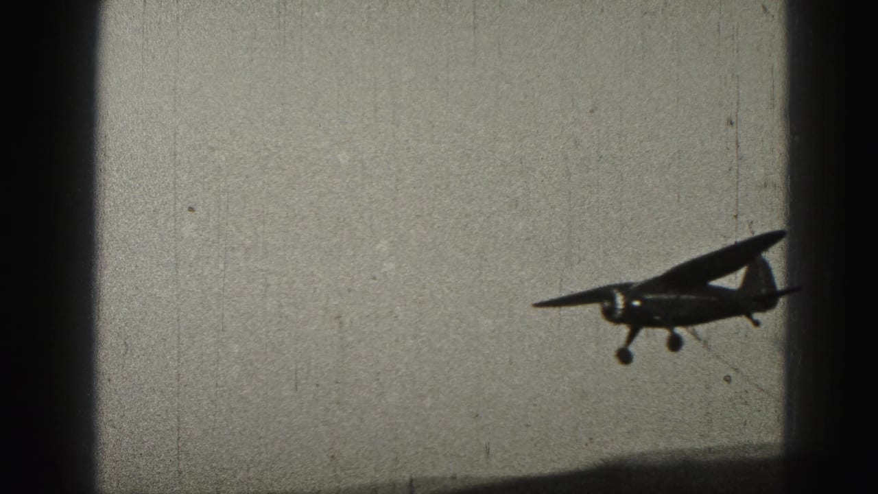 Small high-wing aircraft in side view against a bright sky.