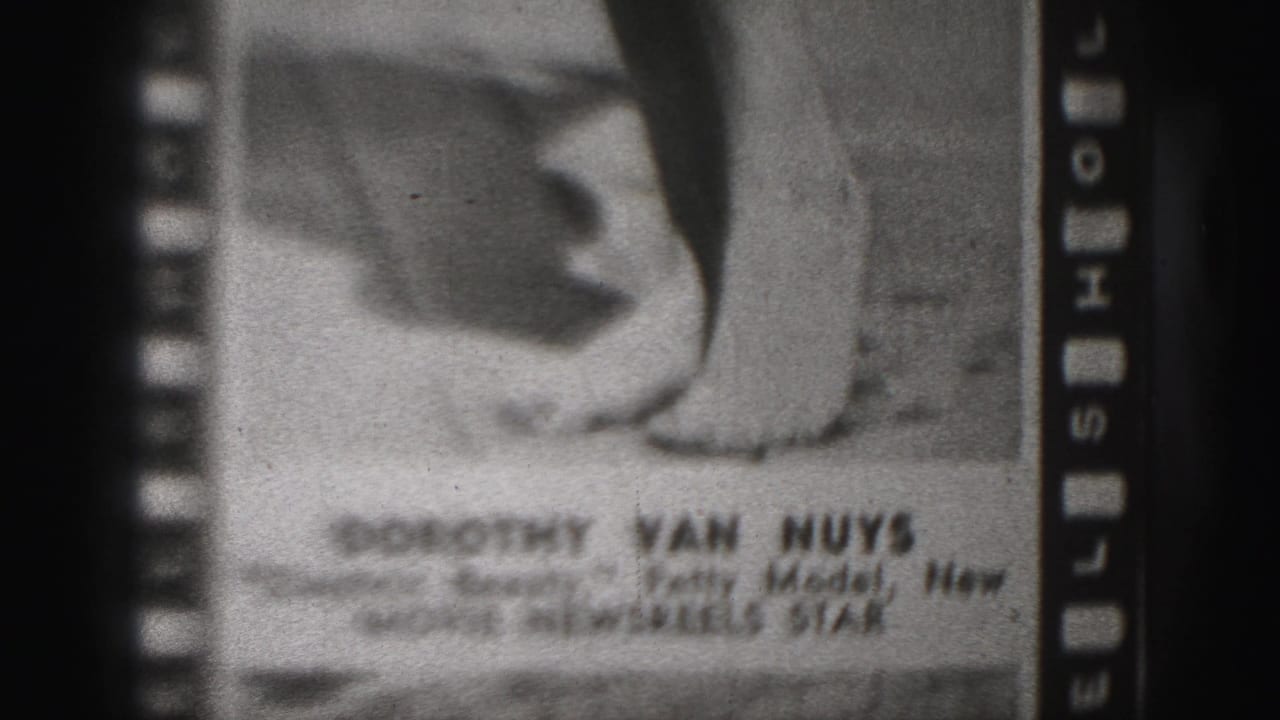 Printed still of a woman's legs with text naming Dorothy Van Nuys near the lower edge.
