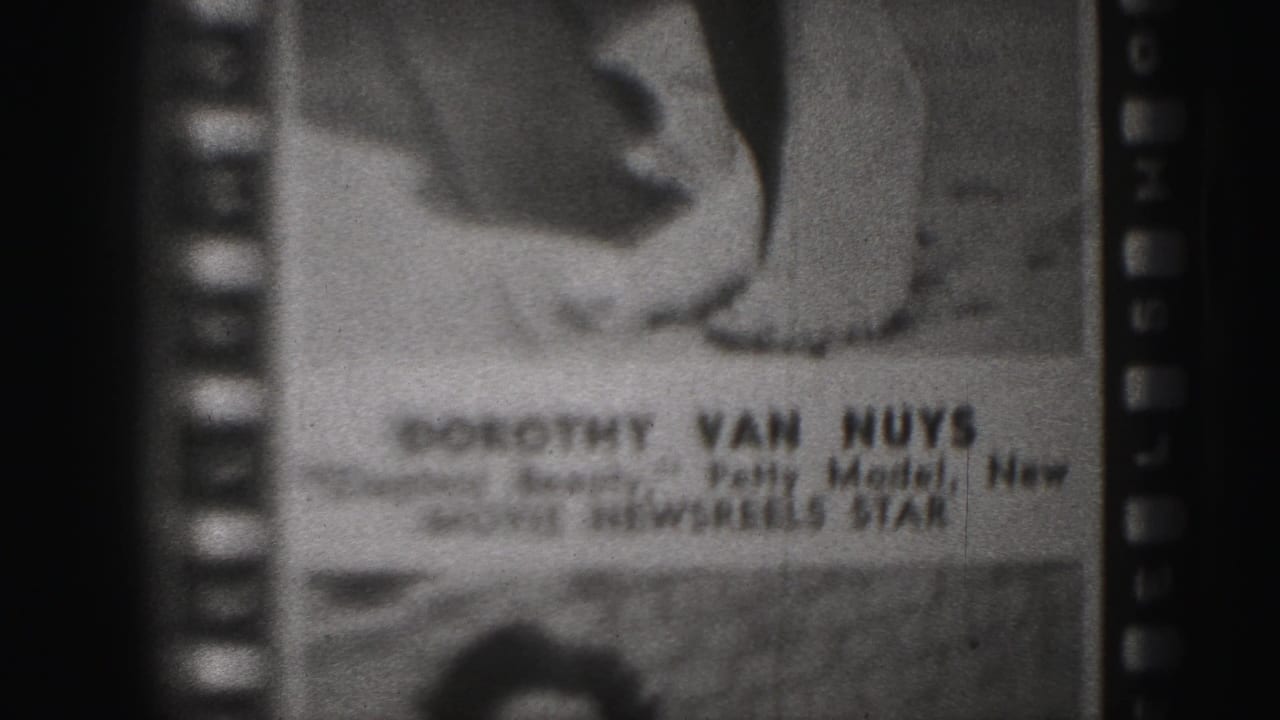 Soft black-and-white title card partly reading Dorothy Van Nuys beside an 8mm sprocket edge.