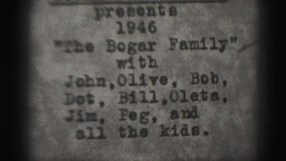 Close 1946 home-movie title card for The Bogar Family, photographed with blur, grain, and darkened edge falloff.