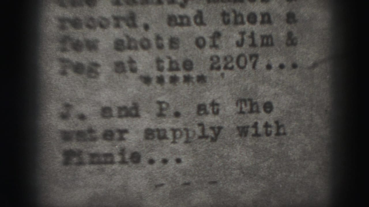 Blurred typewritten title text on a grainy card with dark side vignetting.