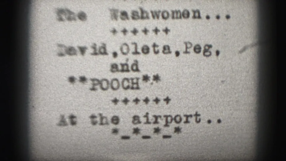Typewritten 8mm title card from the Harrisburg reel, with washwoman wording, names, Pooch, and airport text visible.