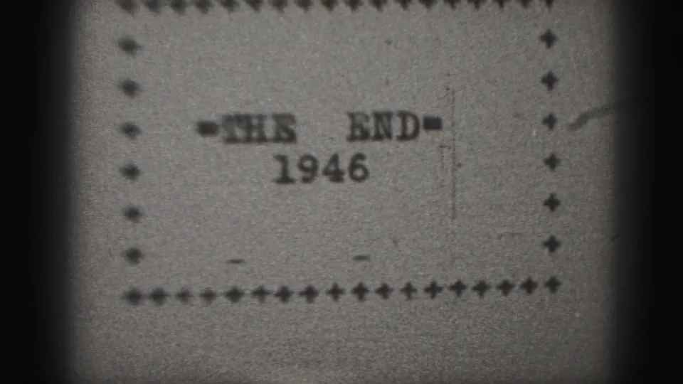 Black-and-white 8mm closing card reading THE END with 1946 beneath it, surrounded by a handmade border.