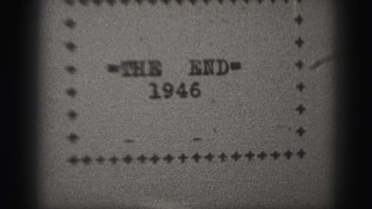 Black-and-white '=THE END=' title card with 1946 inside a dotted border.