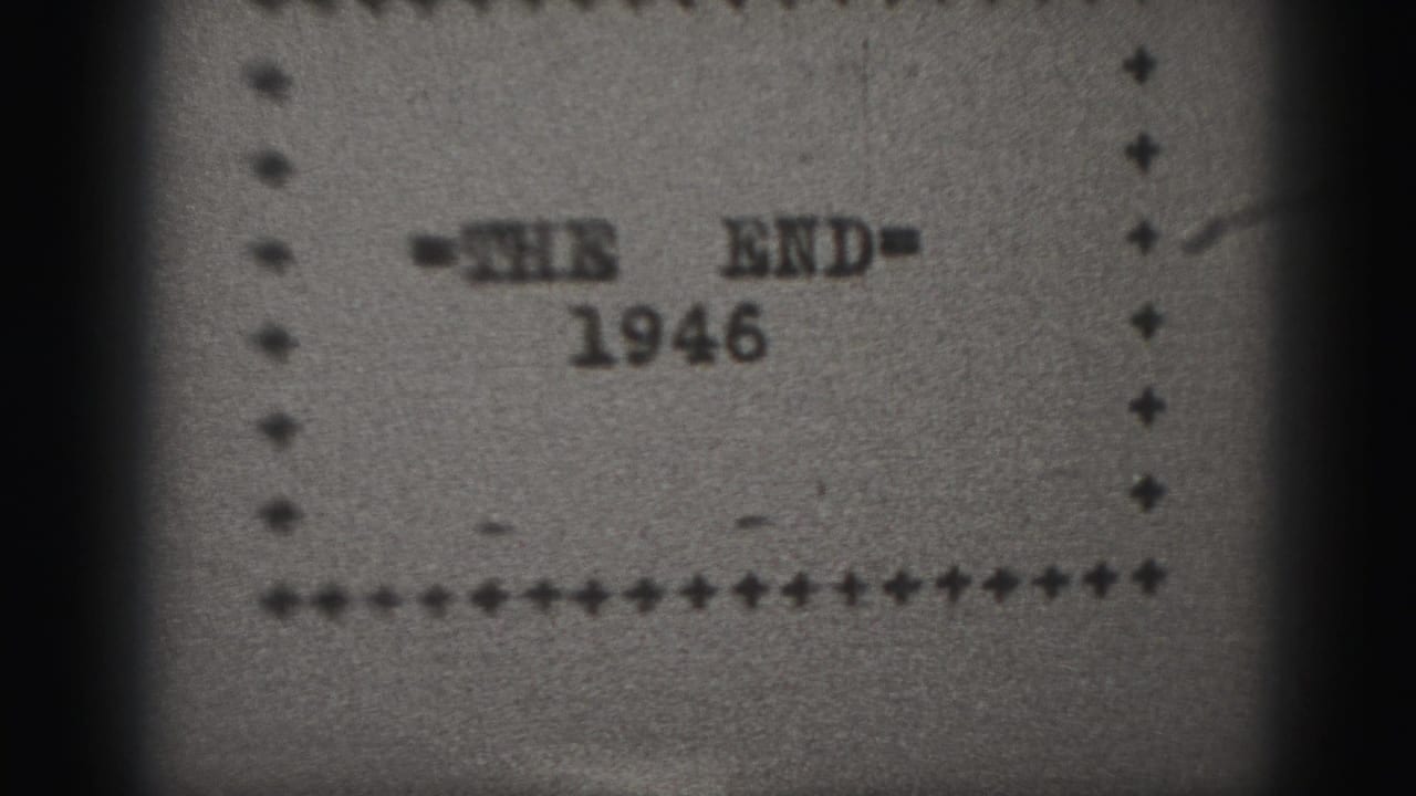 Black-and-white title card reading THE END with 1946 below inside a dotted border.