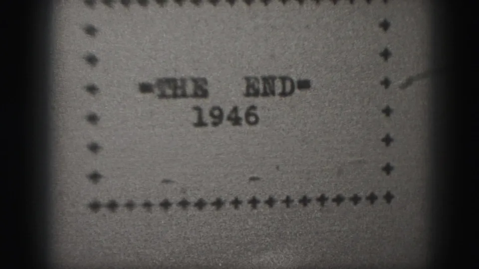 1946 8mm home-movie closing card from Harrisburg, showing THE END and the year beneath a dotted border.
