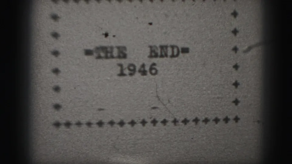 Harrisburg 1946 home-movie end card appears slightly shifted and grainy, with the typed text and border still readable.