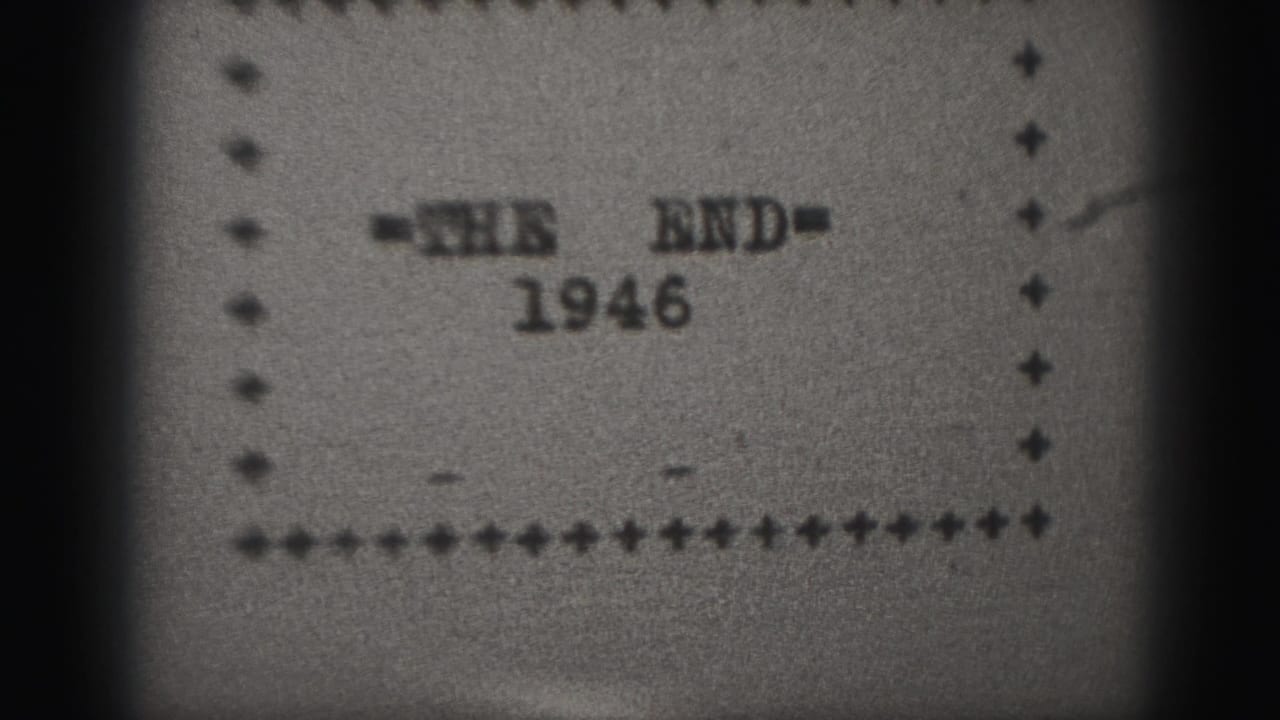 Soft 8mm frame with '=THE END= 1946' inside a decorative dotted border.