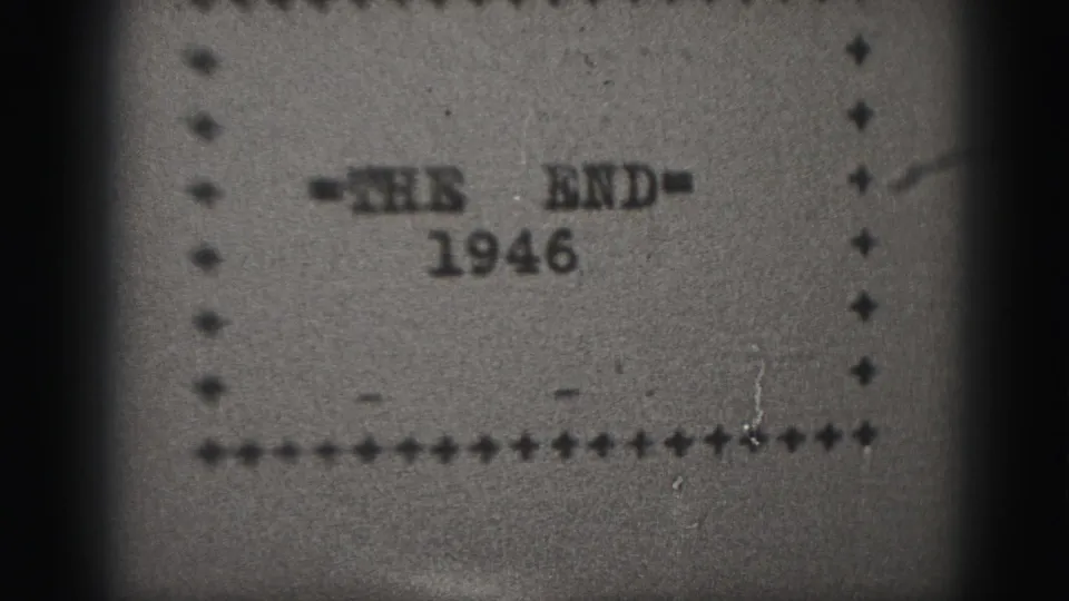 The 1946 end title remains centered, with visible grain, soft registration, and dark 8mm frame edges.