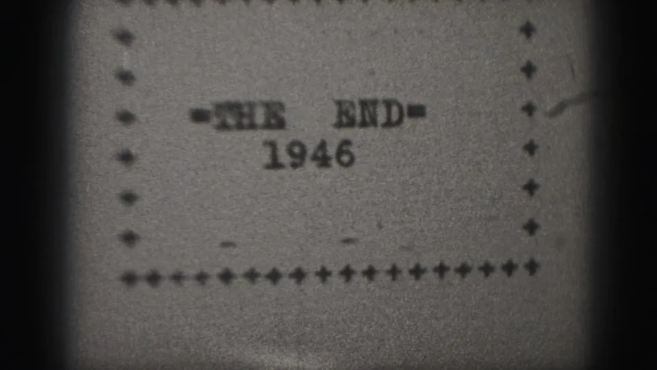 Final visible frame of the 1946 Harrisburg end title card, with soft 8mm texture and dotted border details.