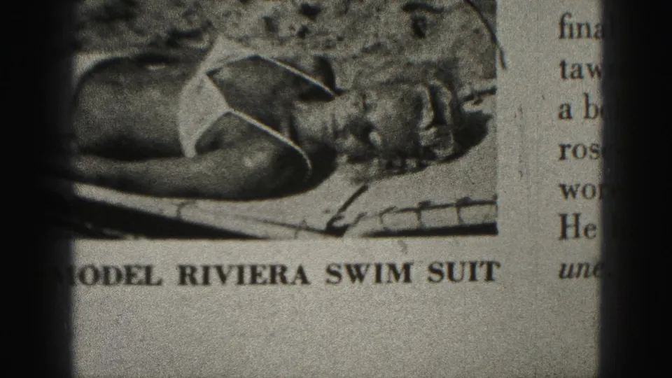1946 Harrisburg 8mm frame showing a filmed newspaper page with a swimsuit model, headline fragment, and adjacent article text.