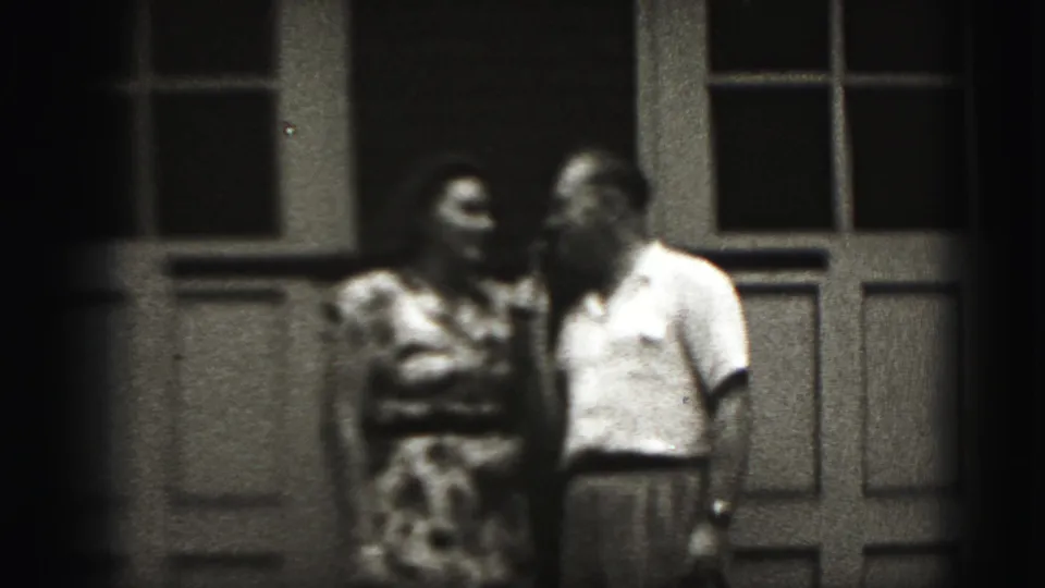 The man and woman appear to share a brief kiss outside the doorway in the supported 1946 Pennsylvania footage.