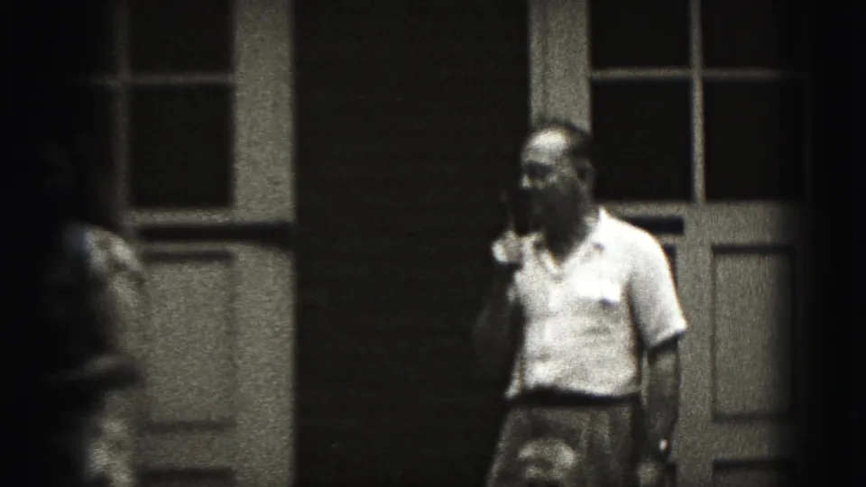 At the end of the 1946 New Cumberland porch shot, the woman exits left and the man remains near the doorway.