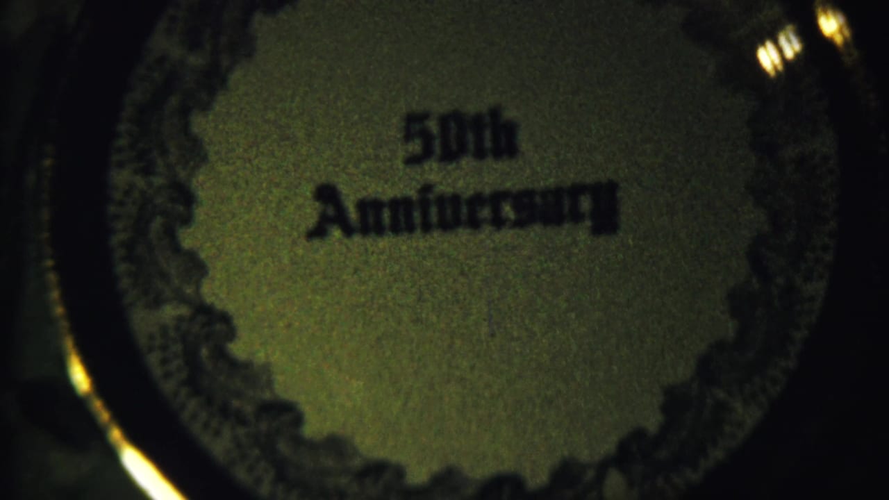Second close view of the same 50th Anniversary circular design, slightly shifted in frame.