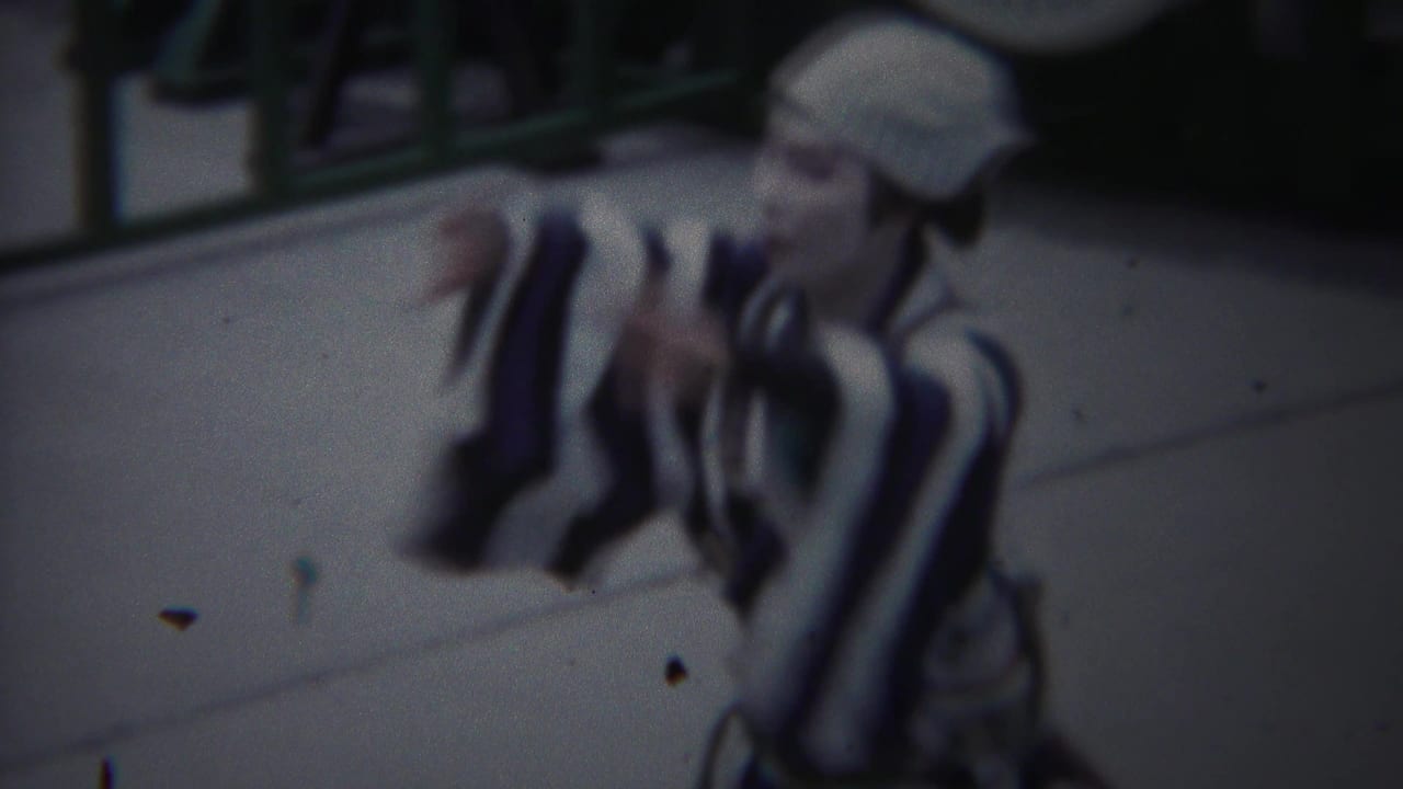 In Yokohama, Japan, 1954, a costumed woman in a striped kimono leans forward during a traditional-style dance.