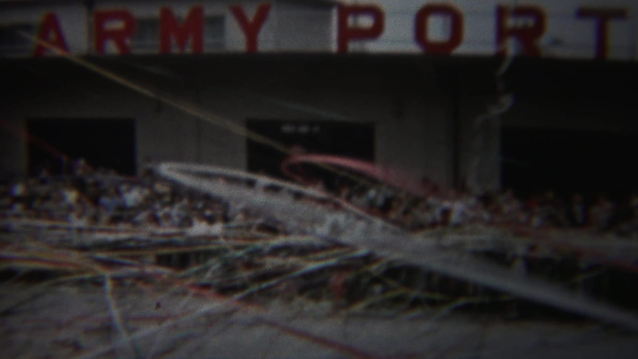 1954 Yokohama Army Port crowd with large streamers sweeping across the foreground and spectators along the building.